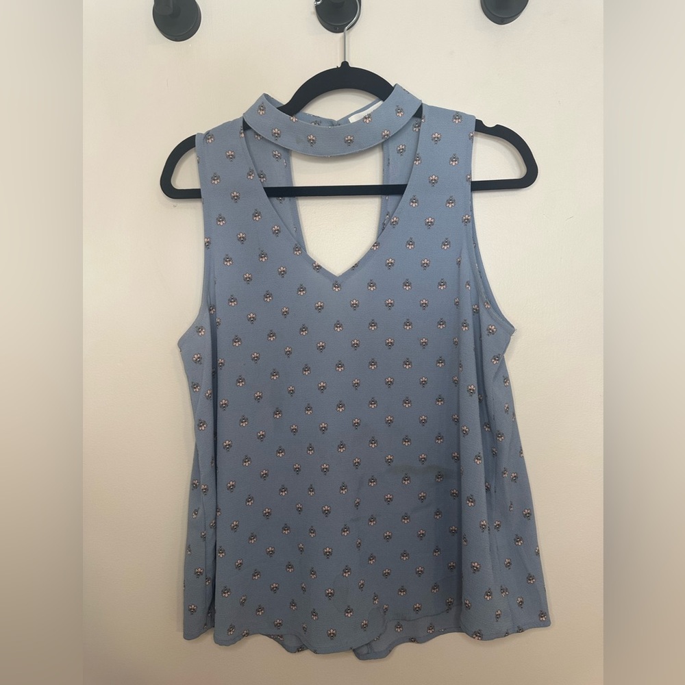 Sleeveless floral blouse
